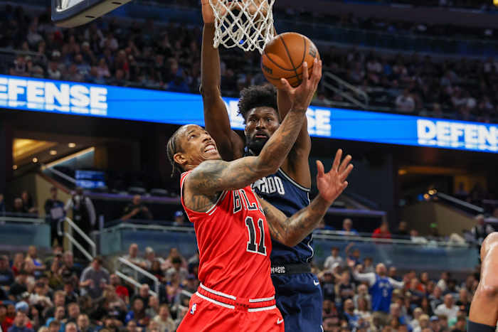 Chicago Bulls forward DeMar DeRozan (11) goes to the basket against Orlando Magic forward Jonathan Isaac (1) during the second half at KIA Center.